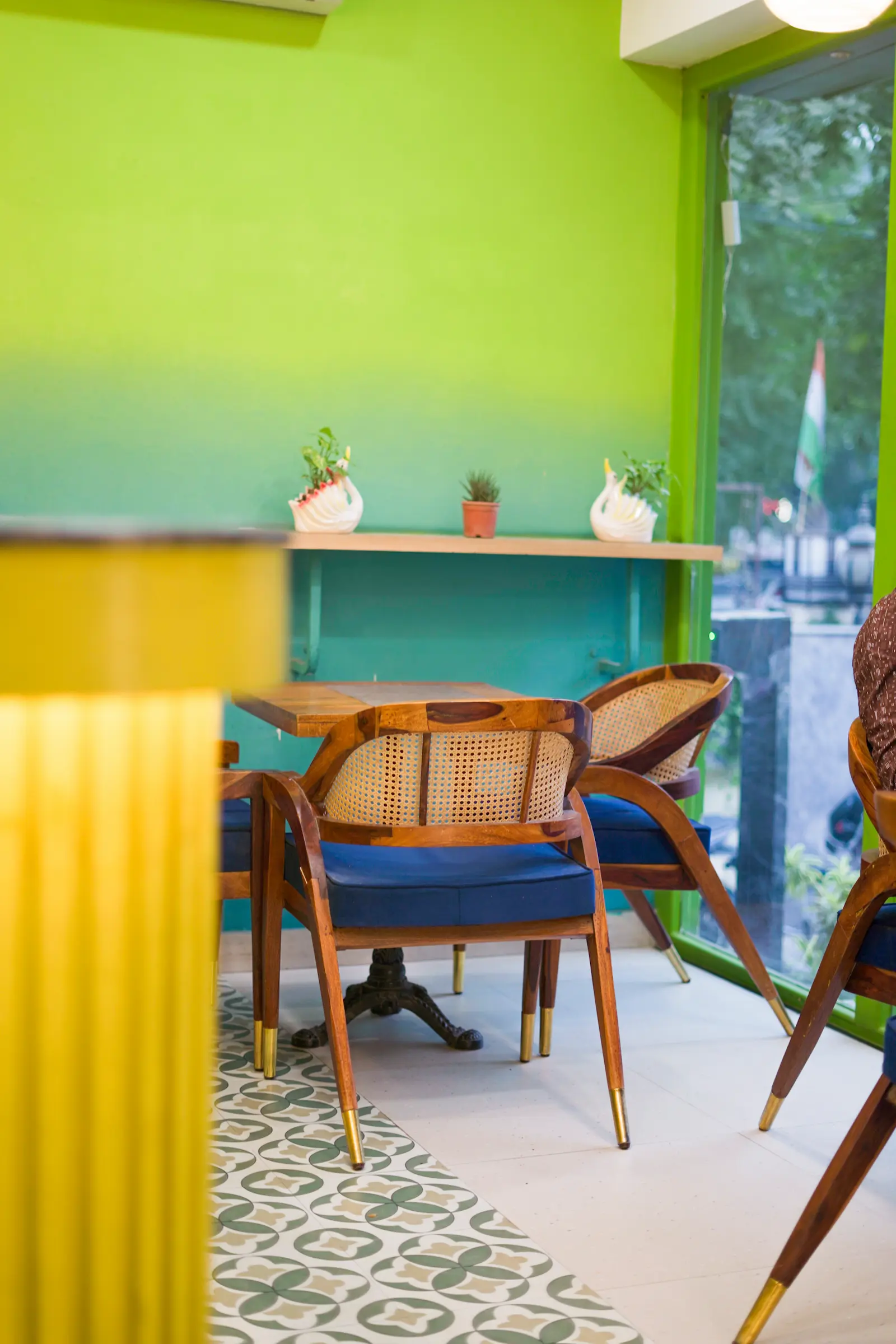 Café and seating area at Amara Hotel Delhi