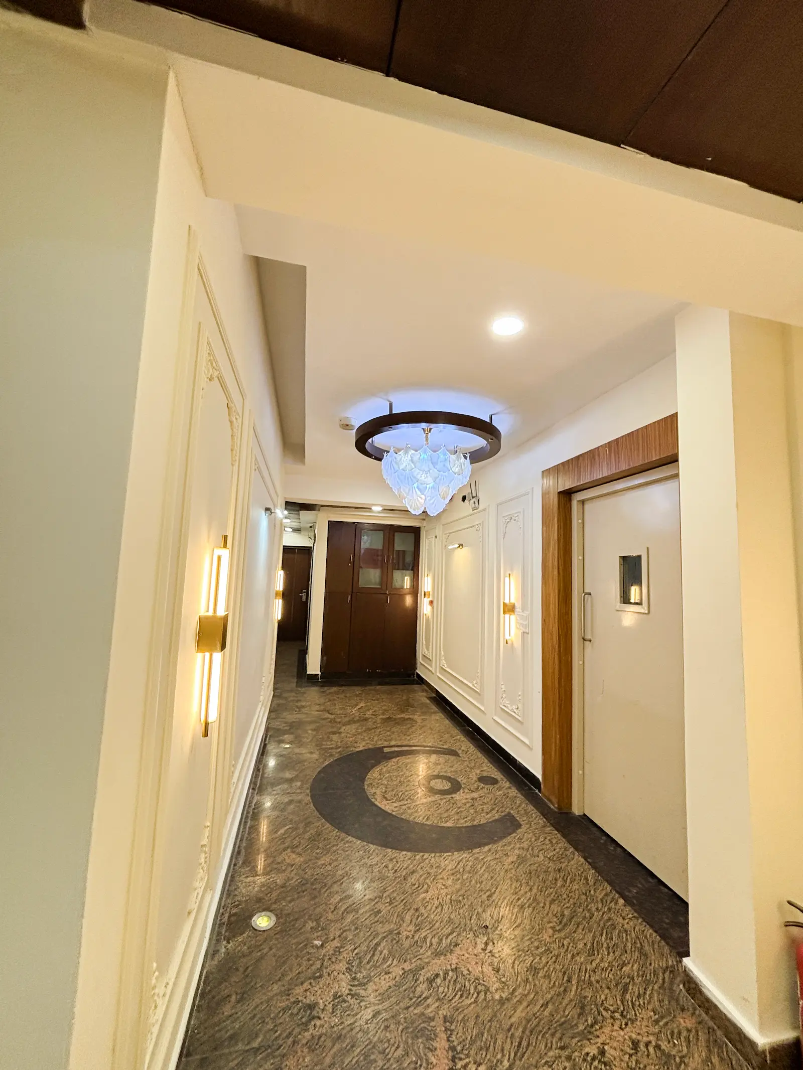 Lobby corridor at Amara Hotel South Delhi